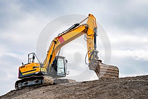 Big excavator in construction site