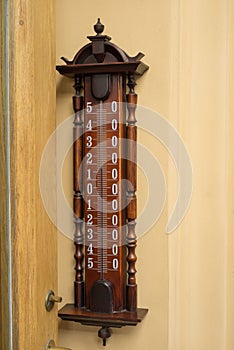 Big external thermometer on a wall closeup