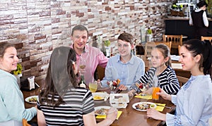 Big family having fun and dinning