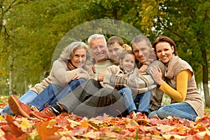 Big family having fun together in autumnal park