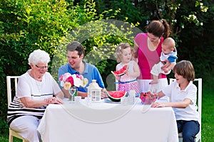 Big family having lunch outdoors