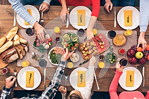 Big family starts lunch or dinner