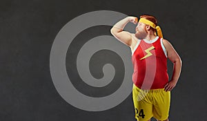 Big fat naked man in sports clothes