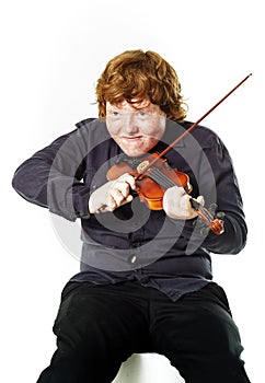Big fat red-haired boy with small violin