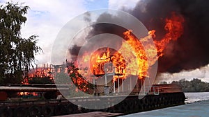 Big fire with black smoke flame in dnepr