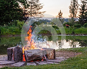 Big fire flames over bright red coal