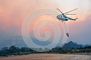 Big fire rescue helicopter gets water