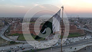 Big Flag of Pakistan in Peshawar in slow motion. Bala Hisar Fort Peshawar Pakistan, Drone Aerial