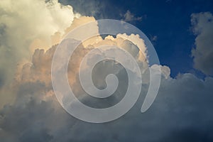 Big, fluffy, billowy cumulus clouds photo