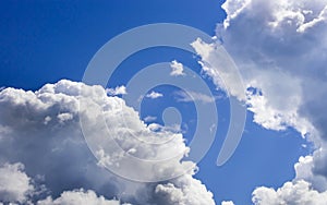A big and fluffy cumulonimbus cloud in the blue sky