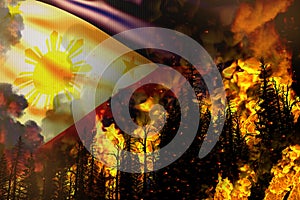 Big forest fire fight concept, natural disaster - heavy fire in the trees on Philippines flag background - 3D illustration of