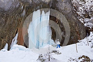 Big frozen waterfall in Seven Ladders Canyon Canionul Sapte Scari, a popular hiking destination in Winter in Brasov, Romania