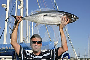 Big game fisherman with saltwater tuna