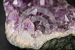 Big geode found in europe with white and purple crystals in the inside