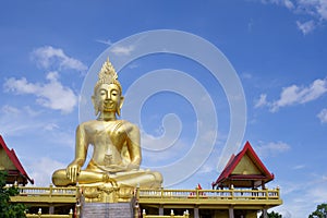 Big golden Buddha, background is blue sky