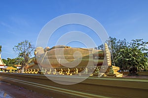 Big golden Buddha statue at Phra Prang Muni temple in Sing Buri province