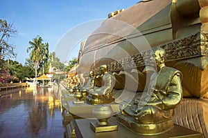 Big golden Buddha statue at Phra Prang Muni temple in Sing Buri province