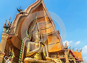 Big golden buddha statue in Wat Tham Sua public buddhist thai temple photo