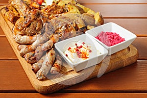 Big grilled meat and vegetables board