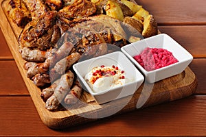 Big grilled meat and vegetables board