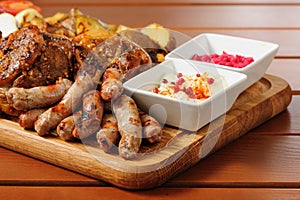 Big grilled meat and vegetables board