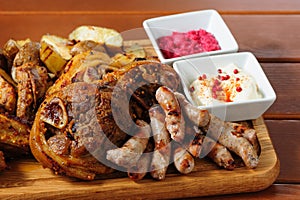 Big grilled meat and vegetables board