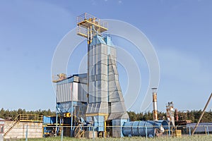 Big group of grain dryers complex for drying wheat. Modern grain silo