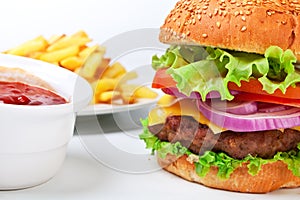 Big hamburger with french fries