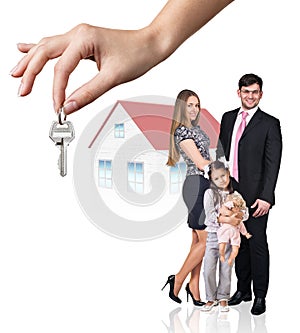 Big hand give keys to young family