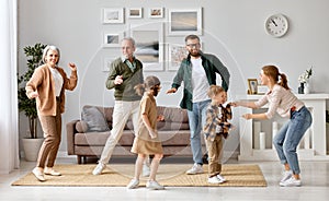 Big happy family having fun in the living room at new home