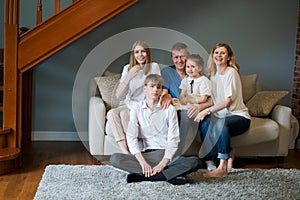 Big happy family. Portrait grandparents, mother father and their two lovely