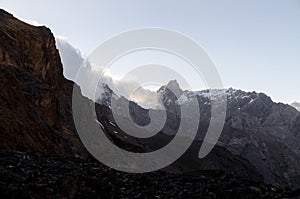 Big and high mountains in Central Asia, Tajikistan. with snow adn clounds