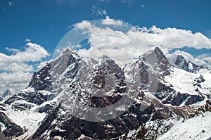 Big and high mountains in Central Asia, Tajikistan. with snow adn clounds