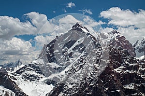 Big and high mountains in Central Asia, Tajikistan. with snow adn clounds