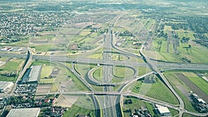 Big highway interchange in outskirts on a sunny summer day