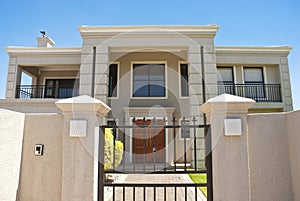 Big house behind gate