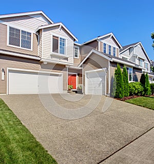 Big house exterior with garage and driveway