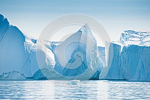 Big icebergs in Atlantic ocean, Ilulissat icefjord, western Greenland