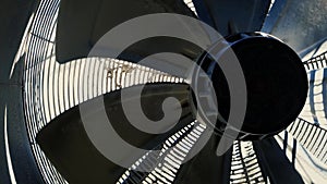 Big industrial fan closeup on factory. Ventilation of industrial plant building.