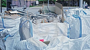 Big Industrial Garbage Bags Full of Construction Site Waste From Office Space Renovation