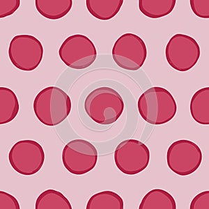 Big irregular polka dots vector seamless pattern. Trendy seamless pattern. Red circles on pink background. Vector