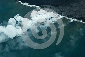 Big Island aerial shot - lava meets ocean