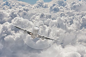 Big jet plane flying through the clouds