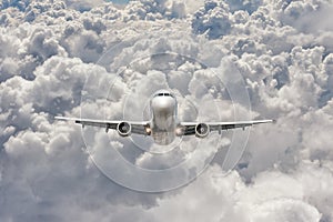 Big jet plane flying through the clouds
