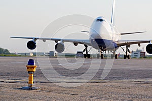 Big jetplane parked at airport photo