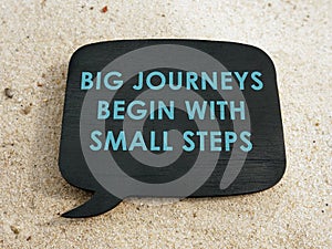 Big journeys begin with small steps motivation phrase on plate.