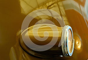 Big locomotive reflector with light bulb on the sidewall.