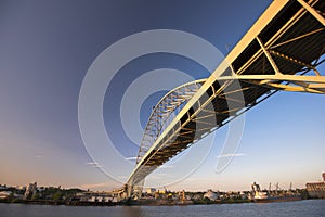 Big long metal arched bridge across the Willamette River photo