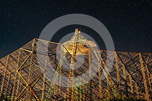 Big metal reflector catching a stars