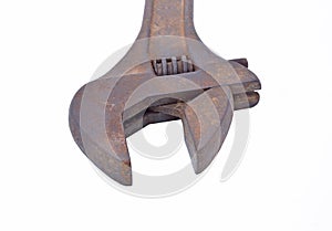 The big metal wrench for untwisting of pipes on a white background